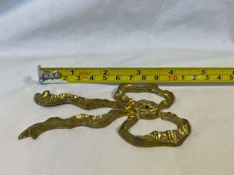 (4) Brass Bows